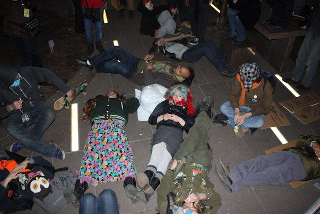 Using the people's mic, protesters were encouraged to lie down on the ground, an act no longer permitted in Zuccotti Park. 